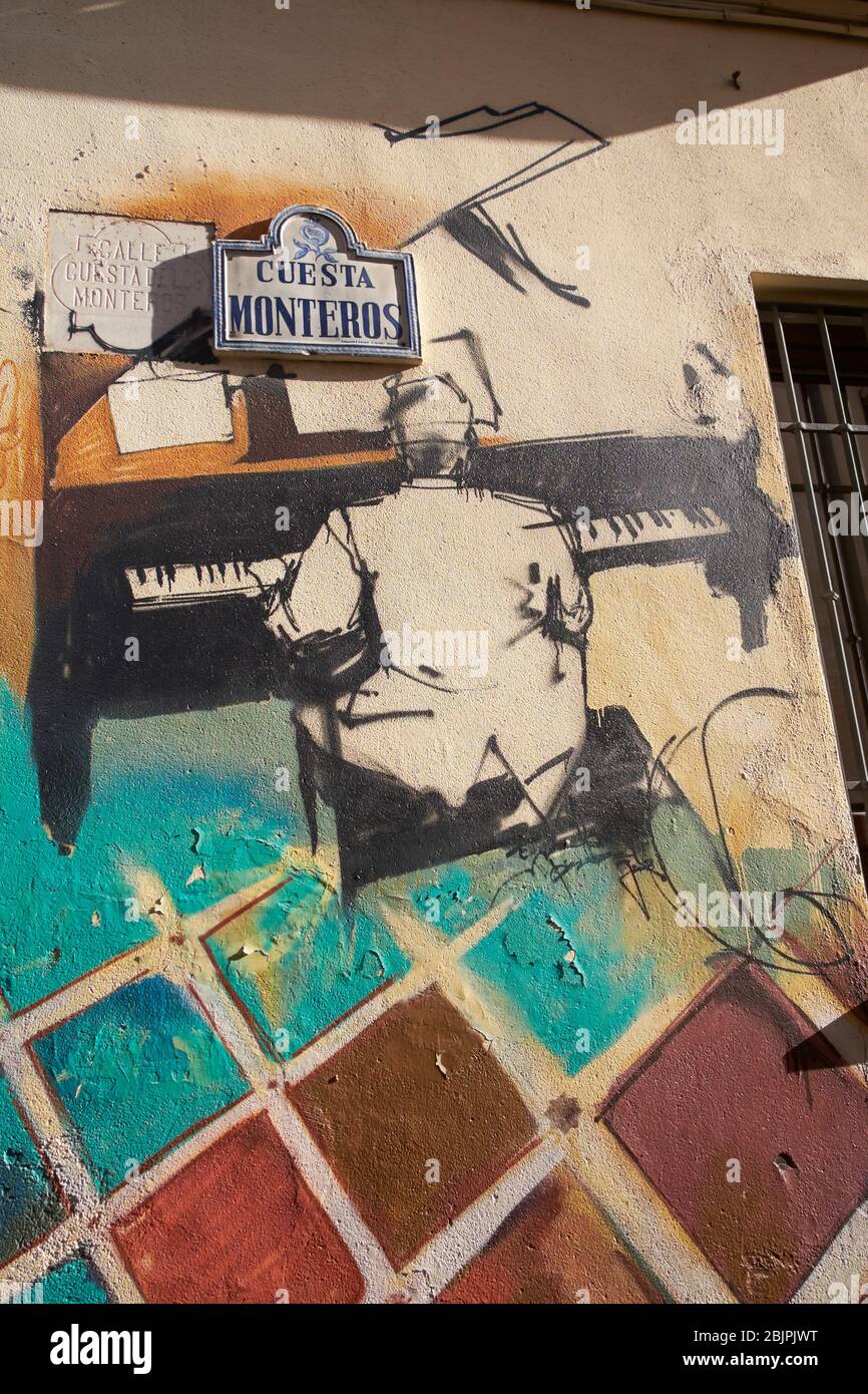 Street art de l'artiste espagnol El Niño de las Pinturas, alias Raul Ruiz, dans Barrio Realejo, Grenade, Andalousie, Espagne. Banque D'Images