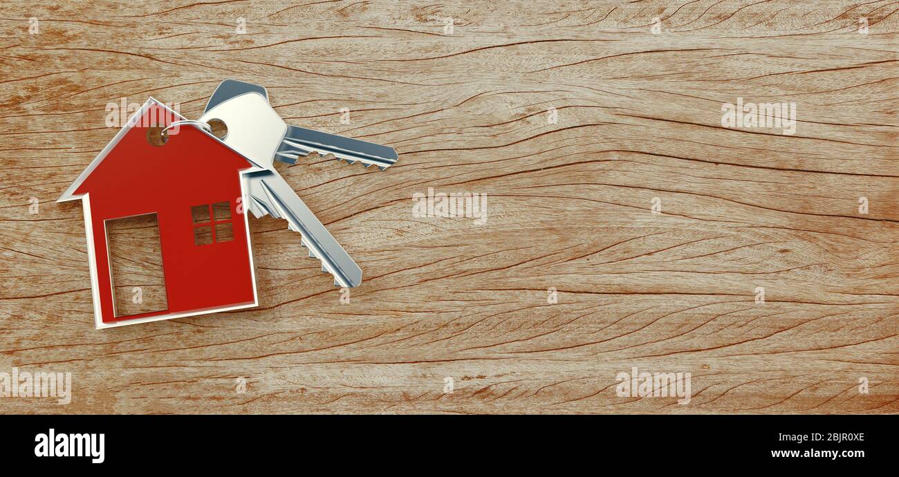 Symbole de la maison avec la clé argentée sur fond de bois vintage. rendu 3d Banque D'Images