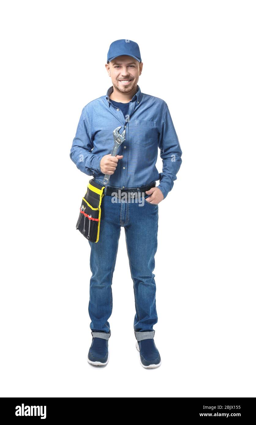 Plombier avec ceinture à outils et clé sur fond blanc Photo Stock - Alamy