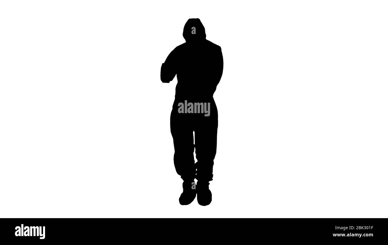 Silhouette Homme médecin en costume de protection avec une tablette numérique. Banque D'Images