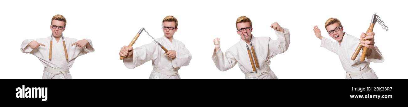 Le funny karate fighter avec nunchucks on white Banque D'Images