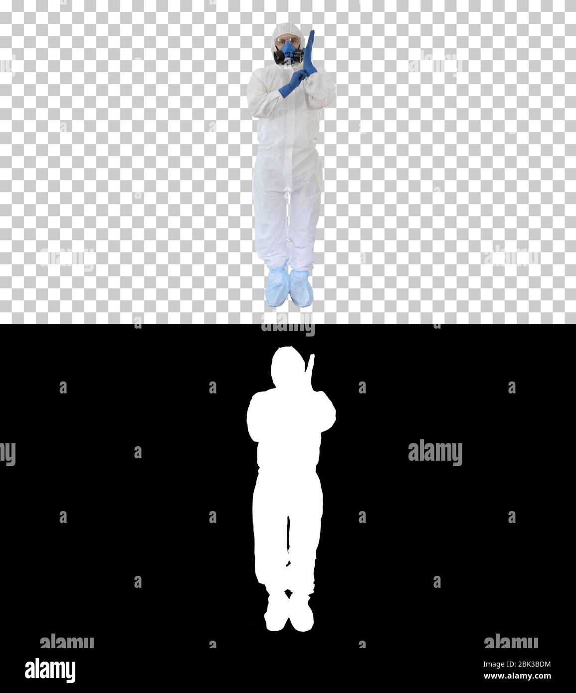 Homme portant des vêtements de protection HAZMAT montrant qu'il porte des gants, Alpha Channel Banque D'Images