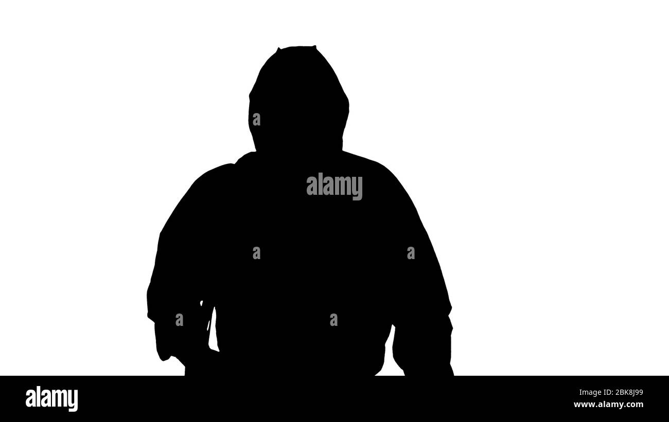 Désinfectant Silhouette marchant avec réservoir de liquide antiviral regardant la caméra. Banque D'Images