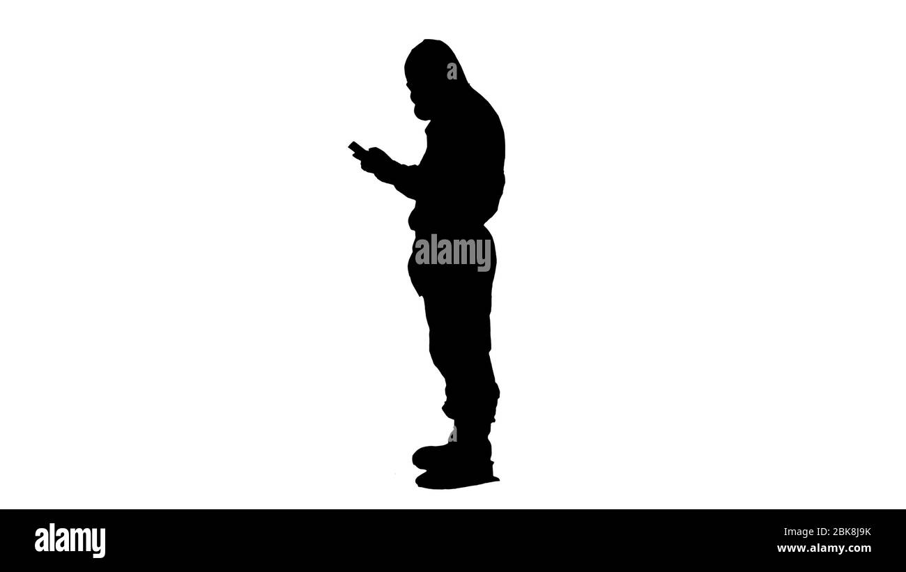 Silhouette médecin en costume de protection avec tablette numérique, concept Covid-19. Banque D'Images