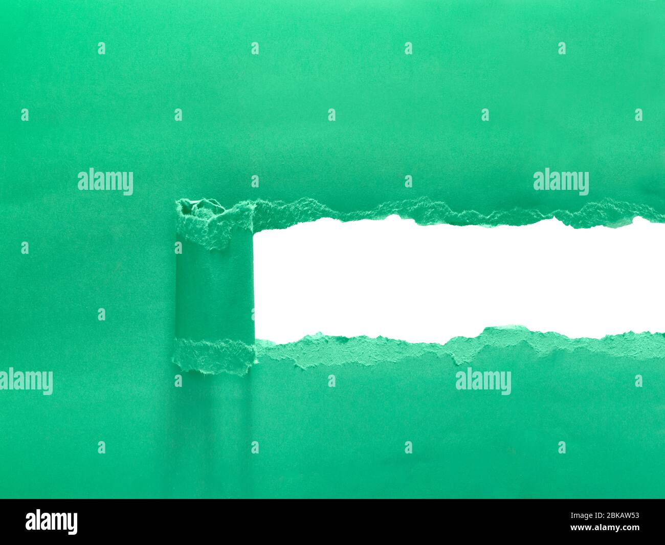 Papier déchiré révélant un espace vide pour le message Banque D'Images