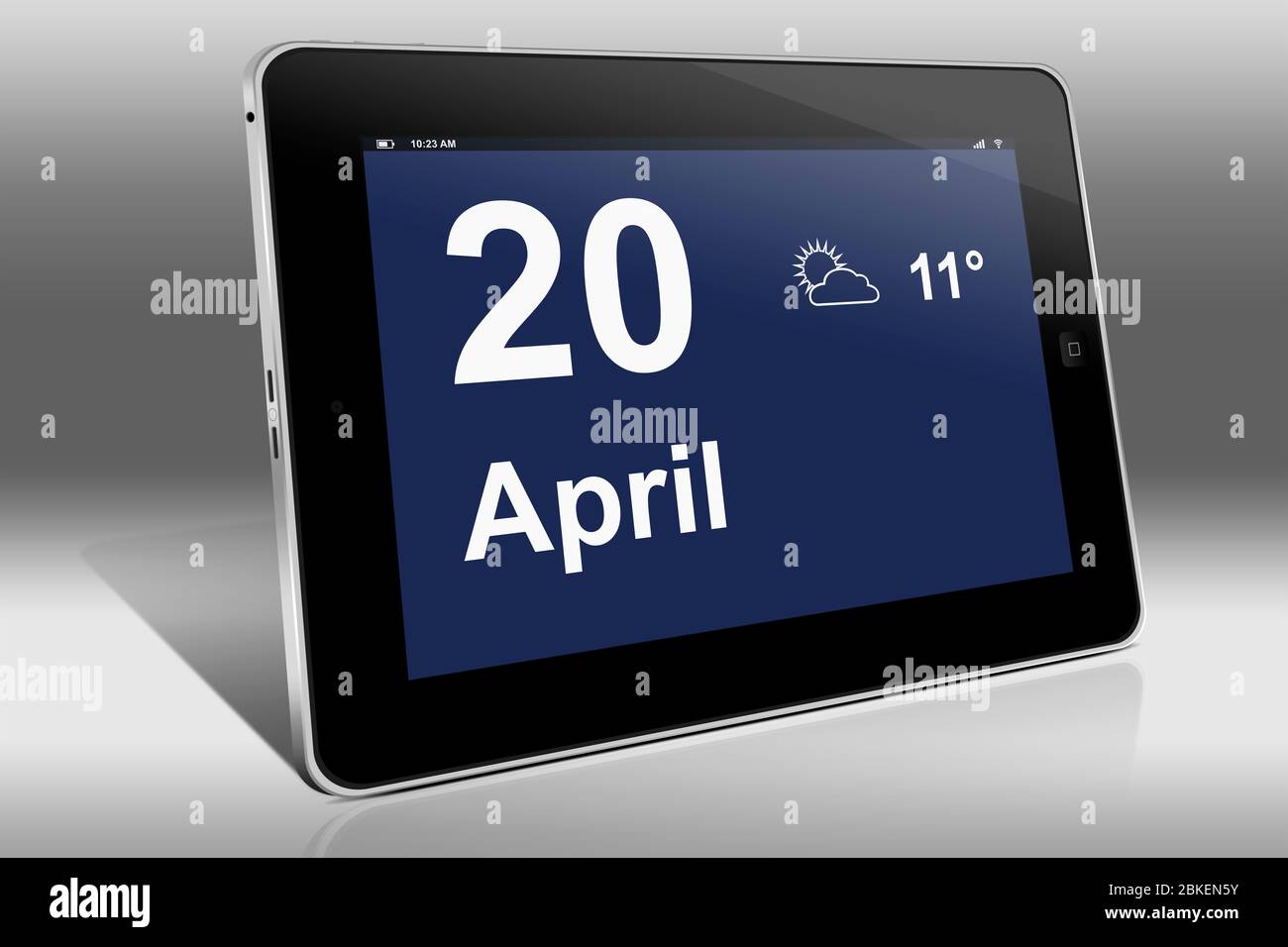 Un ordinateur tablette affiche un calendrier en langue allemande avec la date du 20 avril | Ein Tablet-Computer zeigt das Datum 20. Avril Banque D'Images