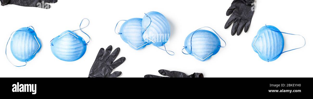 Masque médical et gants de protection composition créative isolés sur fond blanc. Masque de protection contre le coronavirus et la grippe. CO soins de santé Banque D'Images