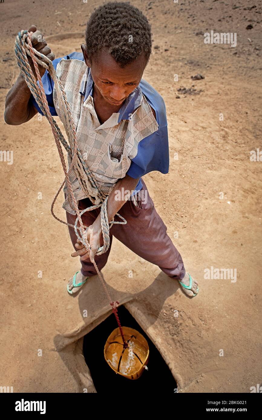 Eau, eau pour animaux, agriculteur, Burkina Faso, Afrique Banque D'Images