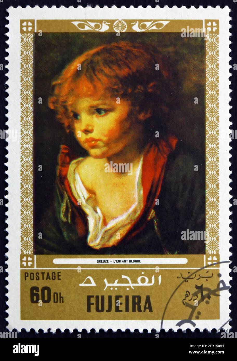 FUJEIRA - VERS 1972 : un timbre imprimé dans la Fujeira montre un garçon aux cheveux blond avec un maillot ouvert, peinture par Jean Baptiste Greuze, peintre français, ci Banque D'Images
