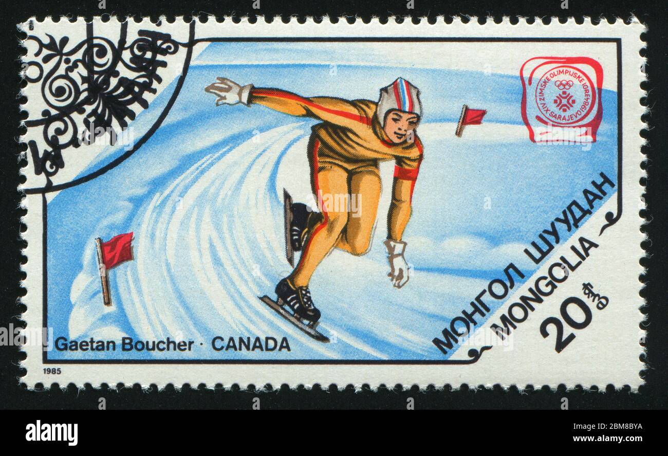 MONGOLIE - VERS 1985 : Jeux olympiques d'hiver de 1984. Gaetan Boucher, Canada, patinage à roues de 1500 mètres, vers 1985. Banque D'Images