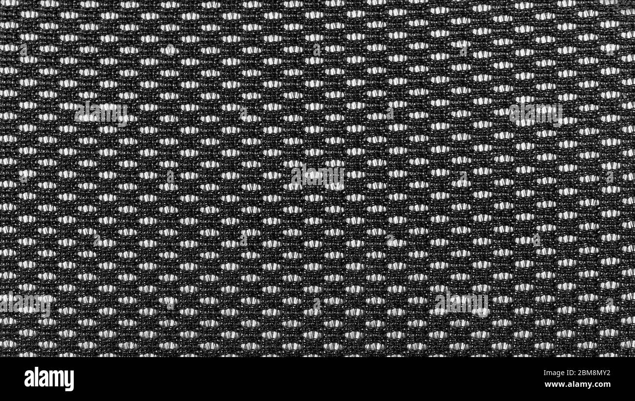 Tissu nid d'abeille noir et blanc en gros plan. Texture et arrière-plan Banque D'Images