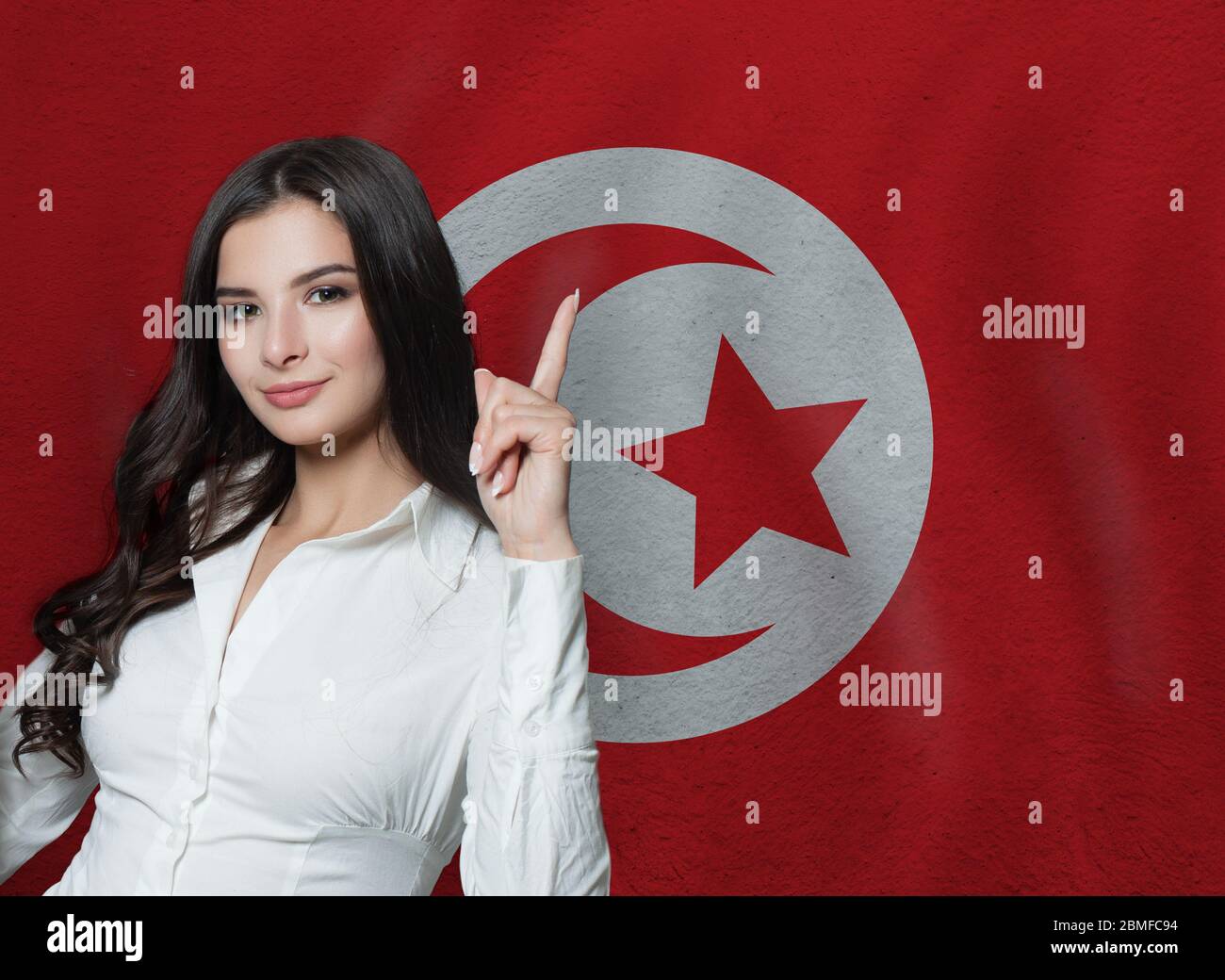 Femme avec pouce vers le haut. Concept d'éducation ou d'affaires Banque D'Images