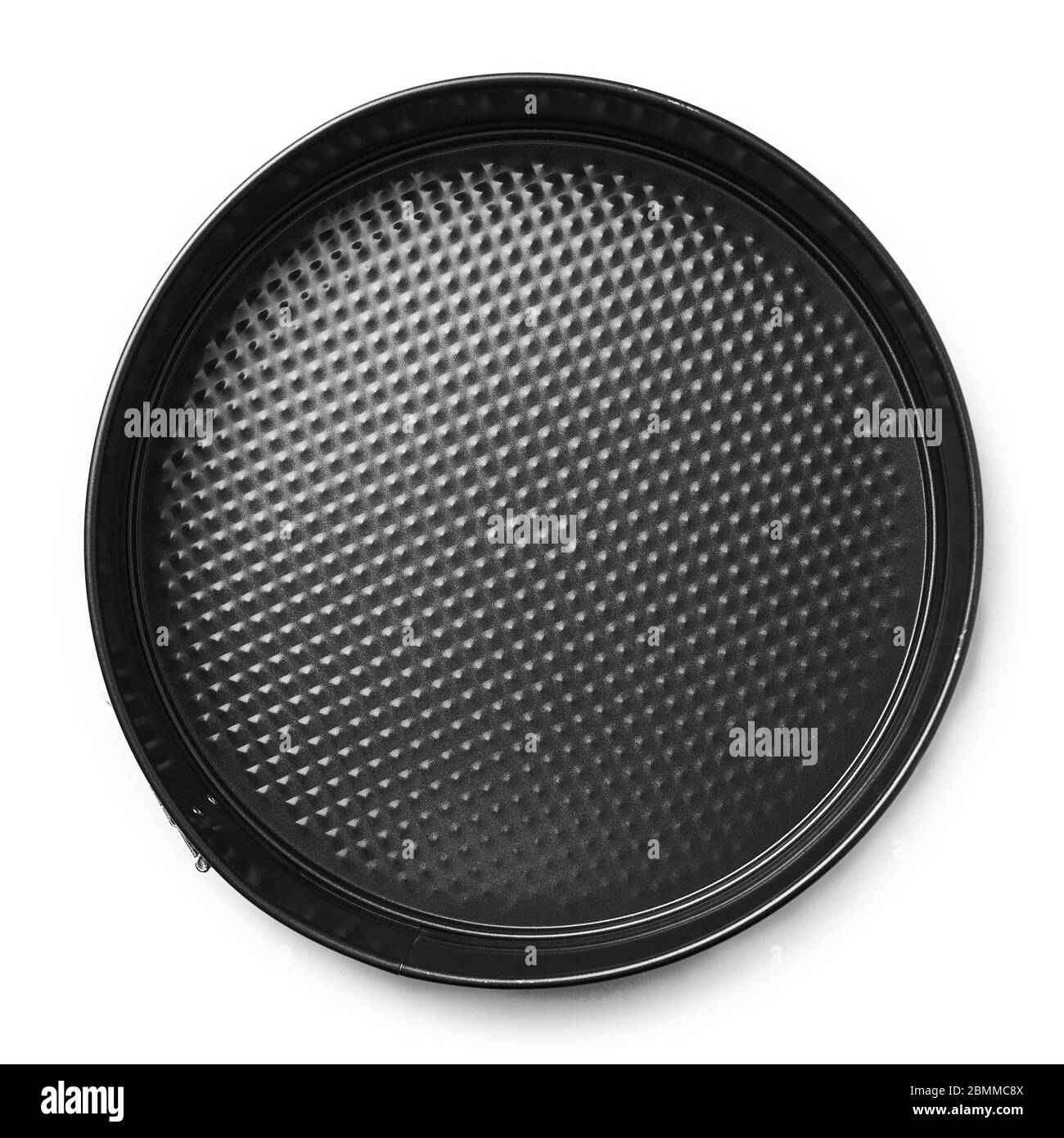 Plat à pâtisserie en métal rond, isolé. Forme de cuisson avec pare-chocs amovibles. Banque D'Images