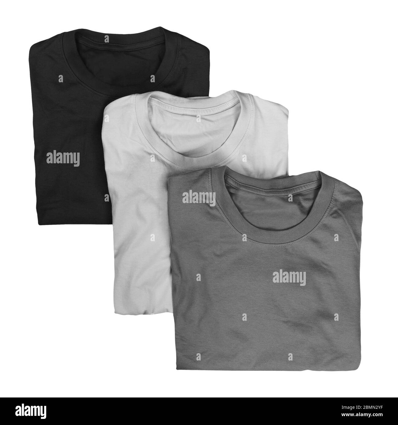 Collection de trois t-shirts pliés isolés sur fond blanc Banque D'Images