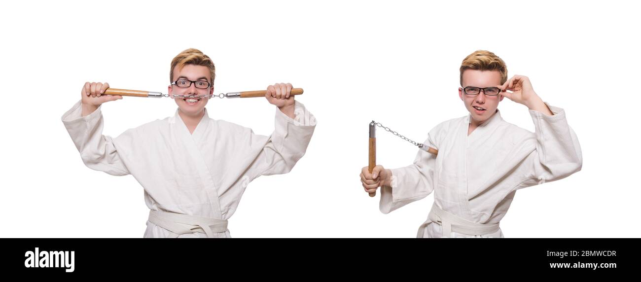 Le funny karate fighter avec nunchucks on white Banque D'Images
