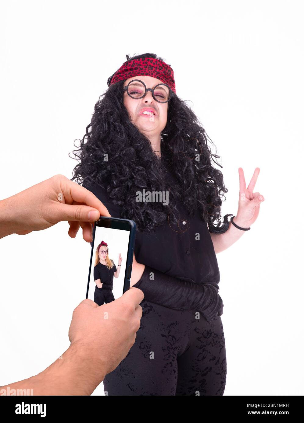 l'influent est menteur au public sur sa vie avec des photos Banque D'Images