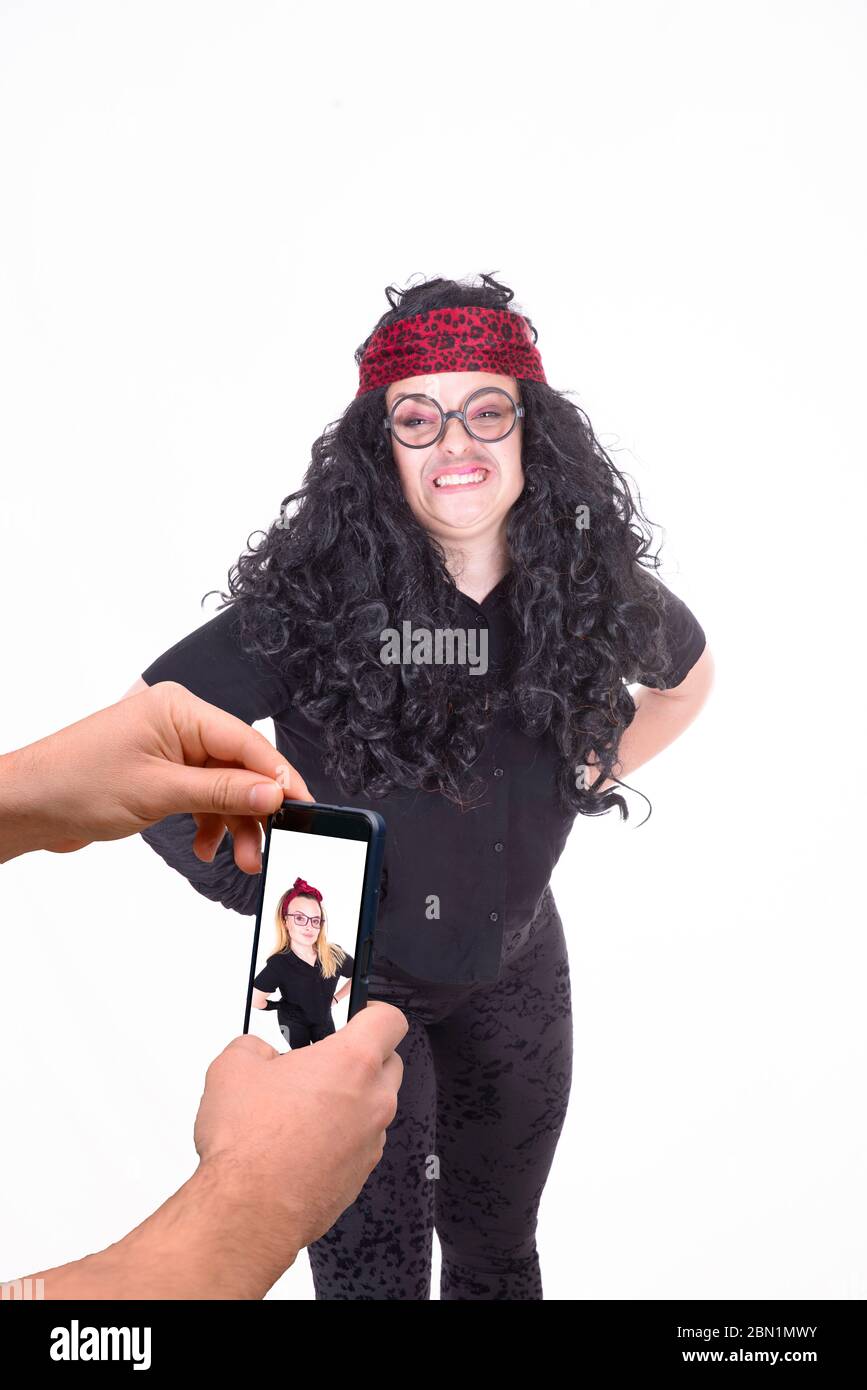 l'influent est menteur au public sur sa vie avec des photos Banque D'Images