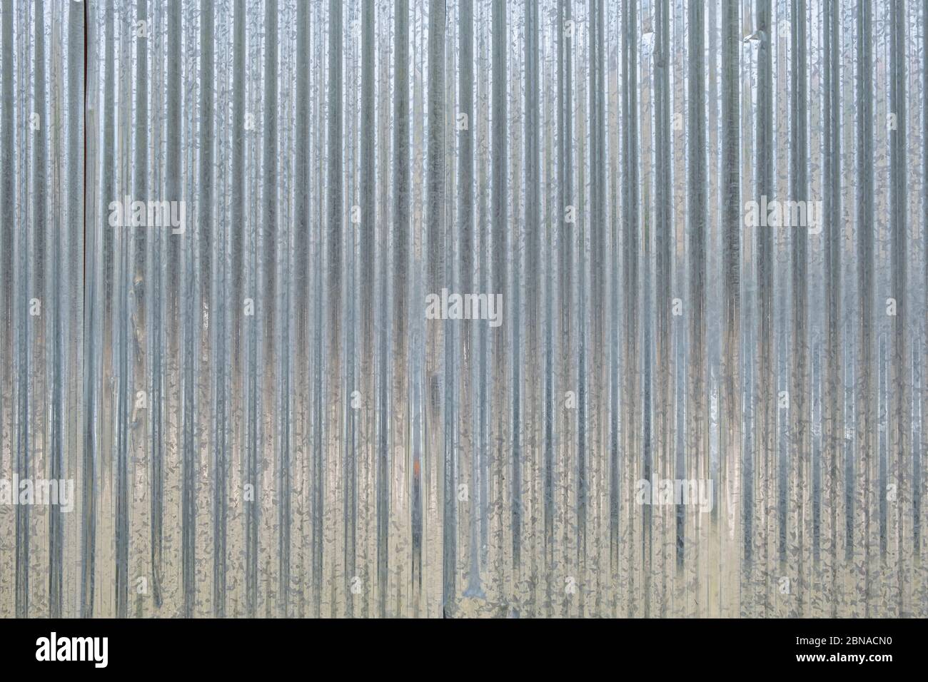 Fond de tôlerie, texture. Profilé en aluminium galvanisé ondulé pour la construction de clôtures, de murs ou de toits Banque D'Images