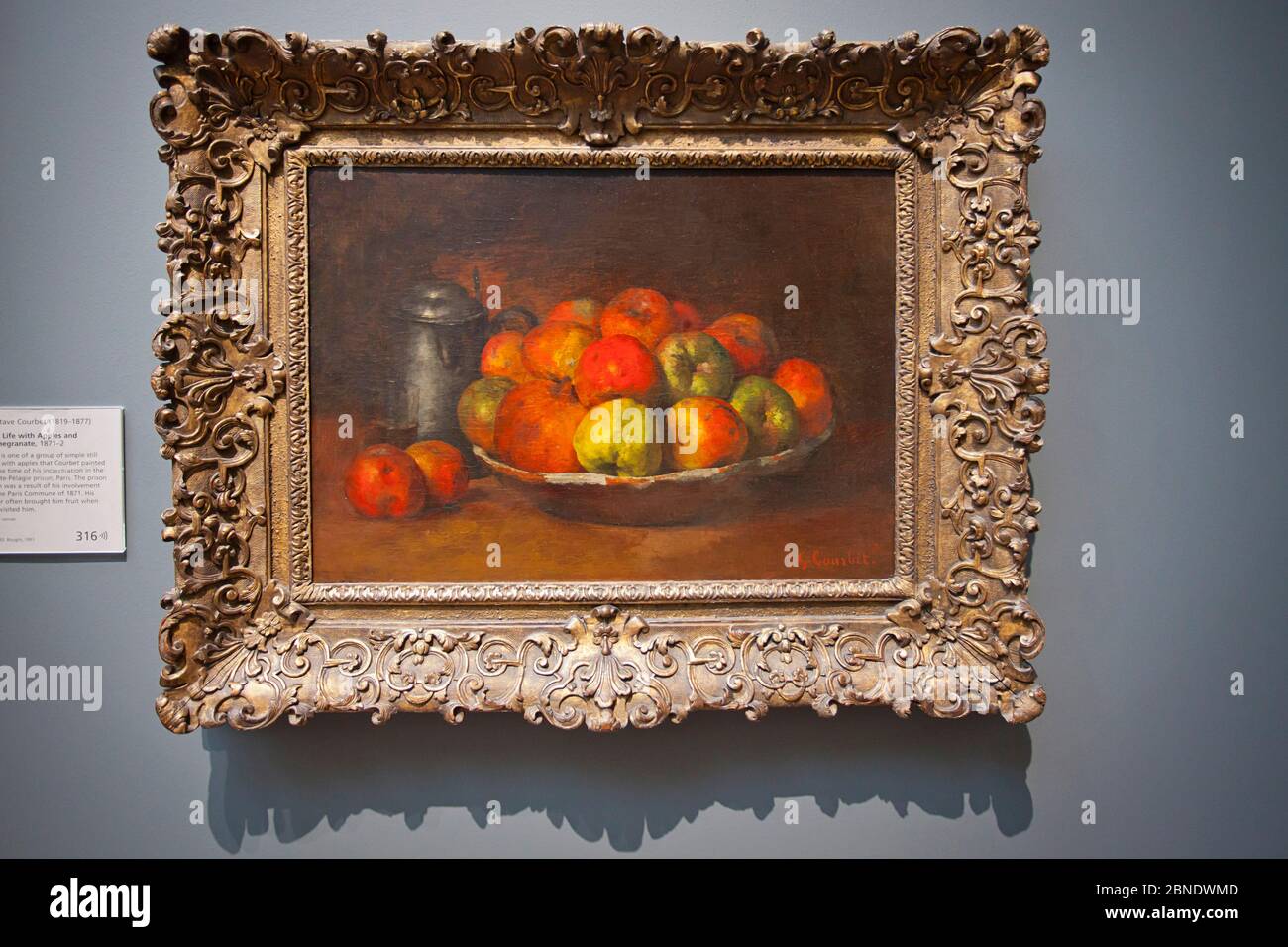 Encore la vie avec des pommes et un grenade de Gustave Courbet Banque D'Images