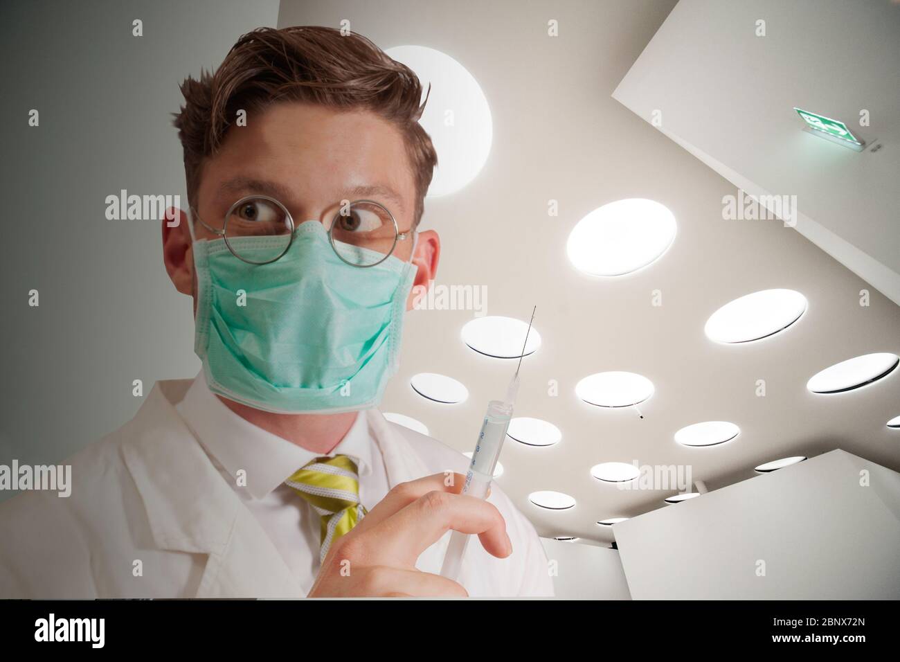 personne entièrement protégée avec masque et écran facial Banque D'Images