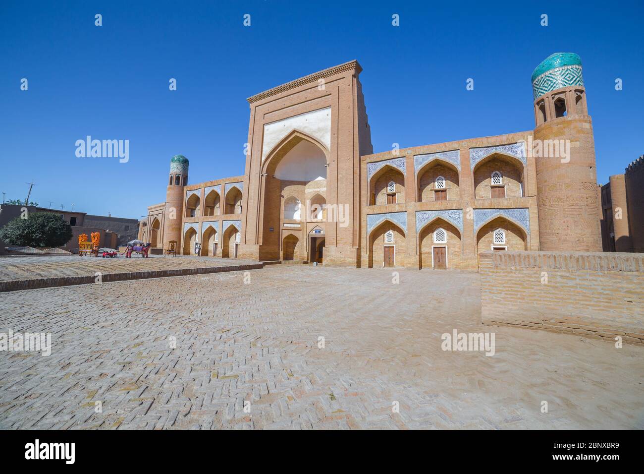 Le Kutlimurodinok Madrasa dans la forteresse d'Ichon-Qala, la vieille ville de Khiva, en Ouzbékistan. Banque D'Images