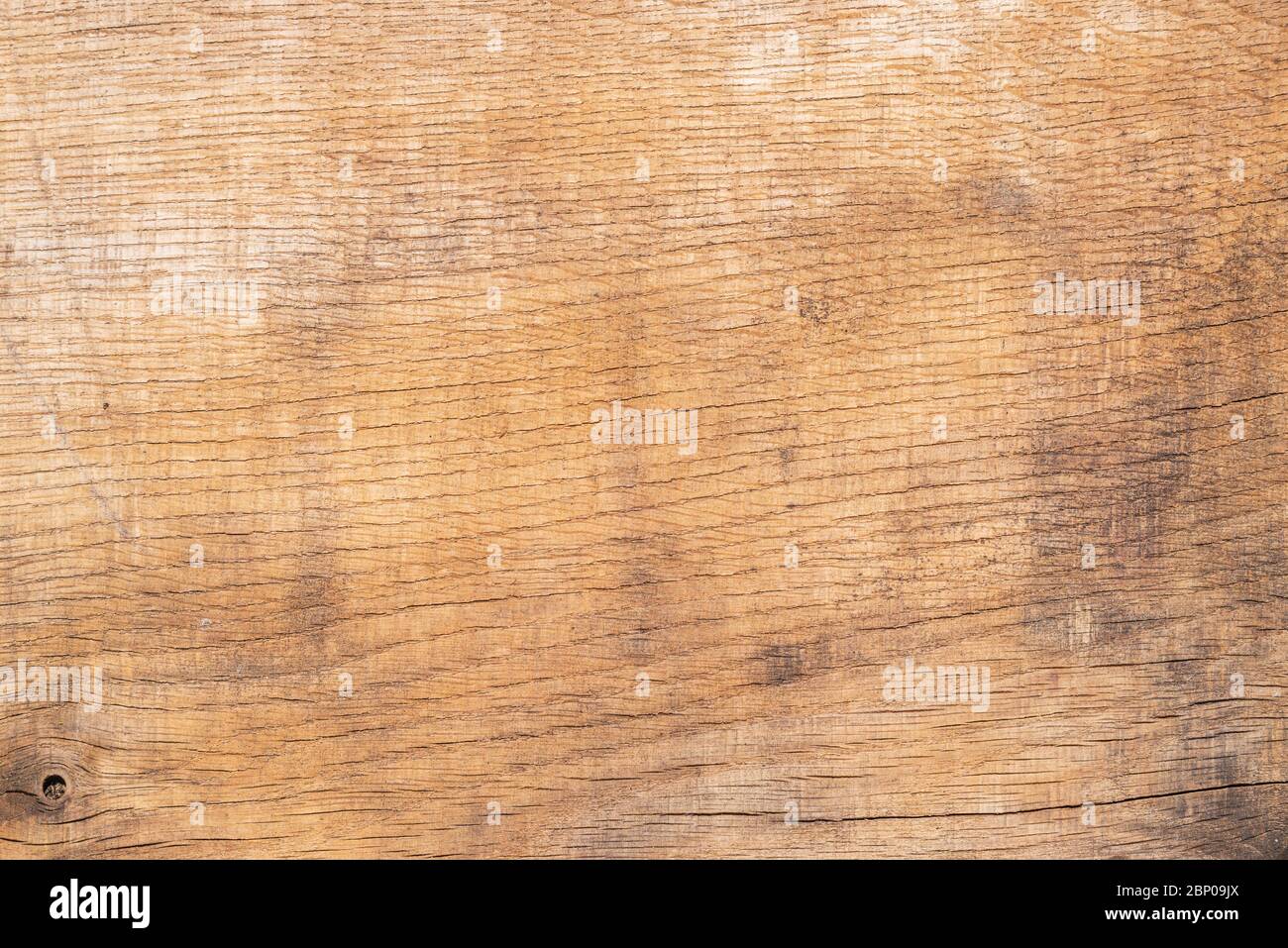 Vieux Fond en bois brun avec noeuds et fissures.Close-up. Banque D'Images