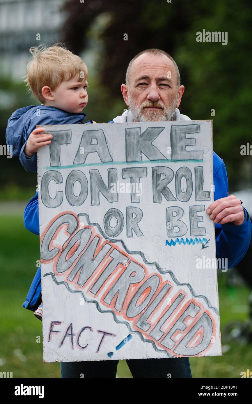 Photos d'un manifestant à Glasgow Green, contre le blocage pandémique du coronavirus. Banque D'Images