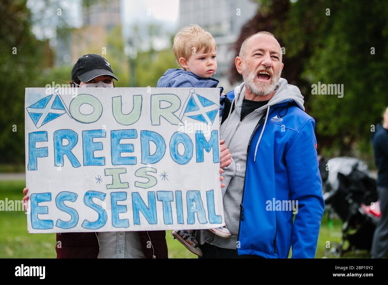 Photos d'un manifestant à Glasgow Green, contre le blocage pandémique du coronavirus. Banque D'Images