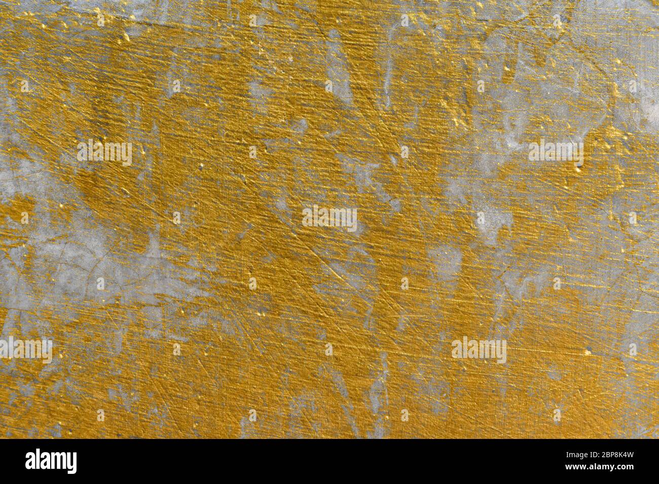 Abstrait doré désordonné mur texturé. Fond doré vintage grunge. Banque D'Images