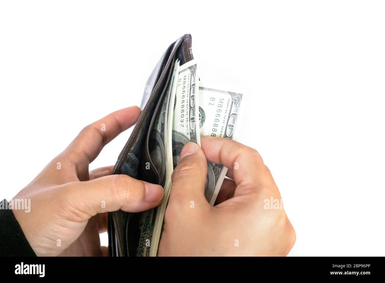Femme de prendre de l'argent dollar billets de wallet Banque D'Images