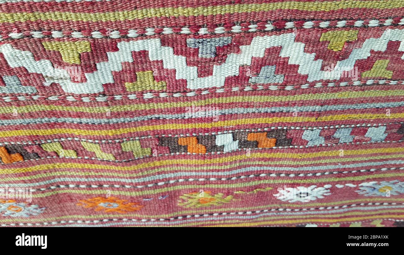 Tapis en zigzag de texture tissée à motif folk. Arrière-plan ethnique arabe de tapis. Toile de fond du bazar turc Banque D'Images
