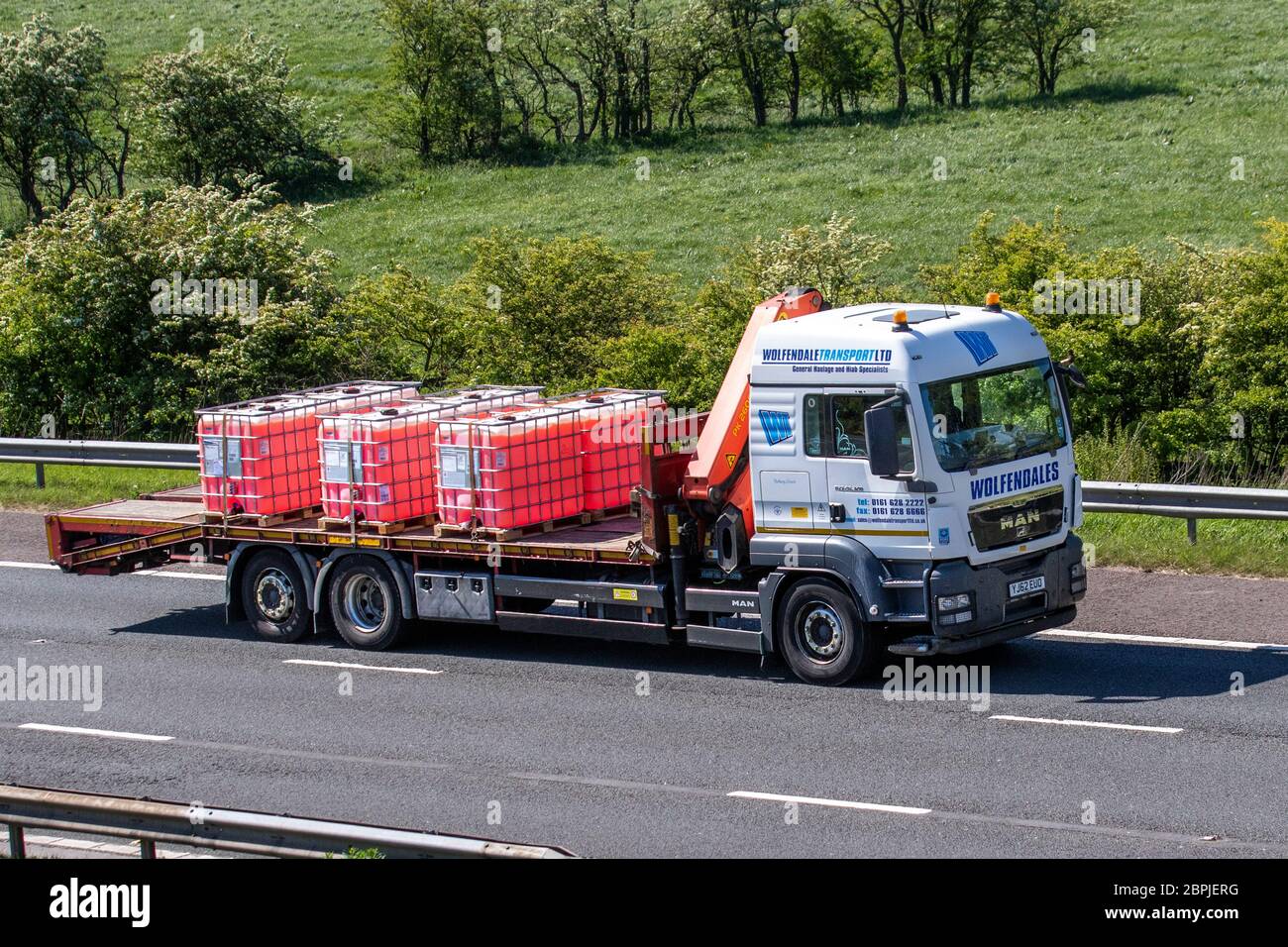 Wolfendale transport livraison de camions, camion, transport, camion, porte-cargaison, véhicule de transport, industrie européenne du transport commercial, autoroutes M6 UK à Manchester. Banque D'Images