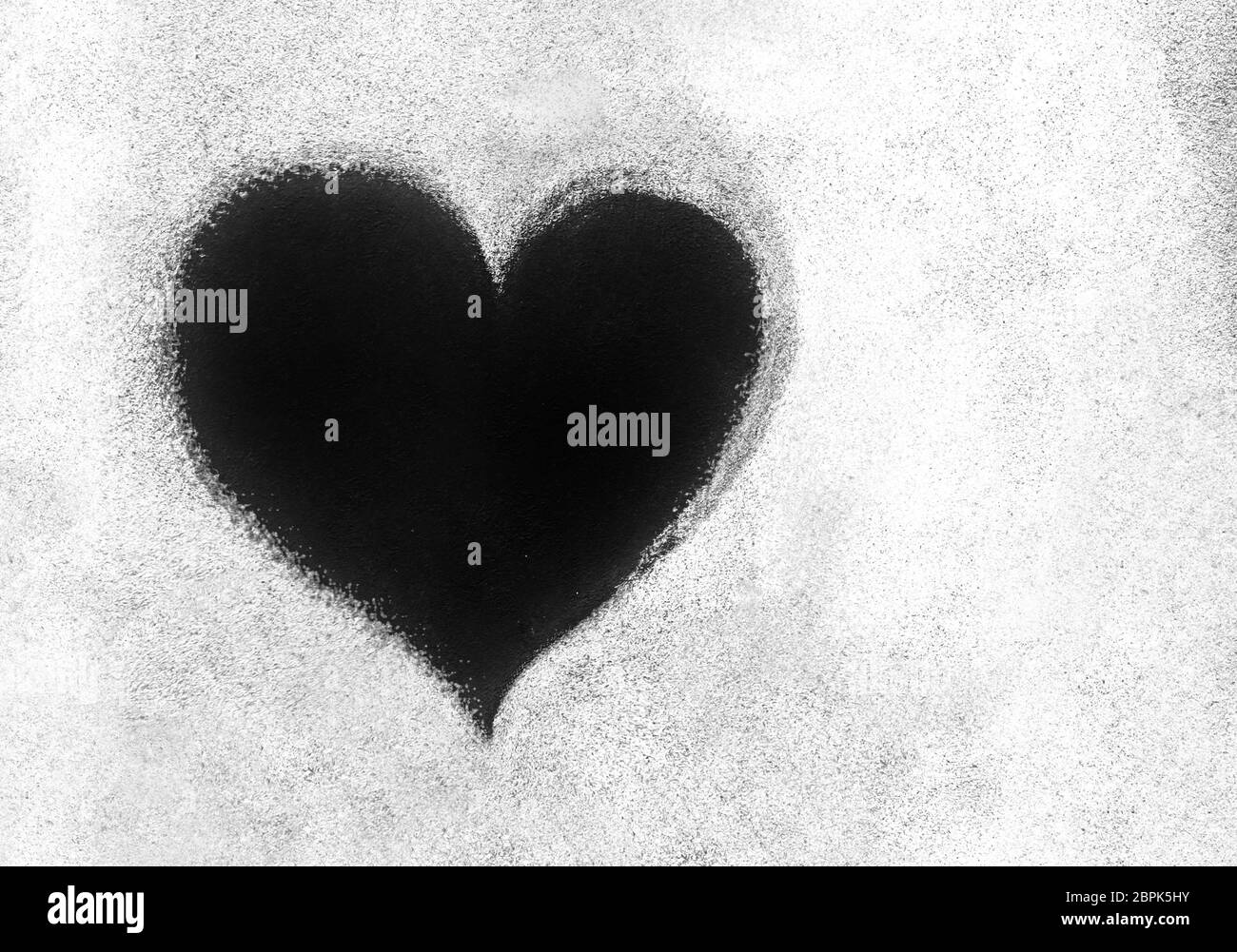 Grunge texture avec le symbole du coeur noir. Il peut être utilisé comme le thème de la St-Valentin, affiches, papier peint design, t-shirts et plus encore. Banque D'Images