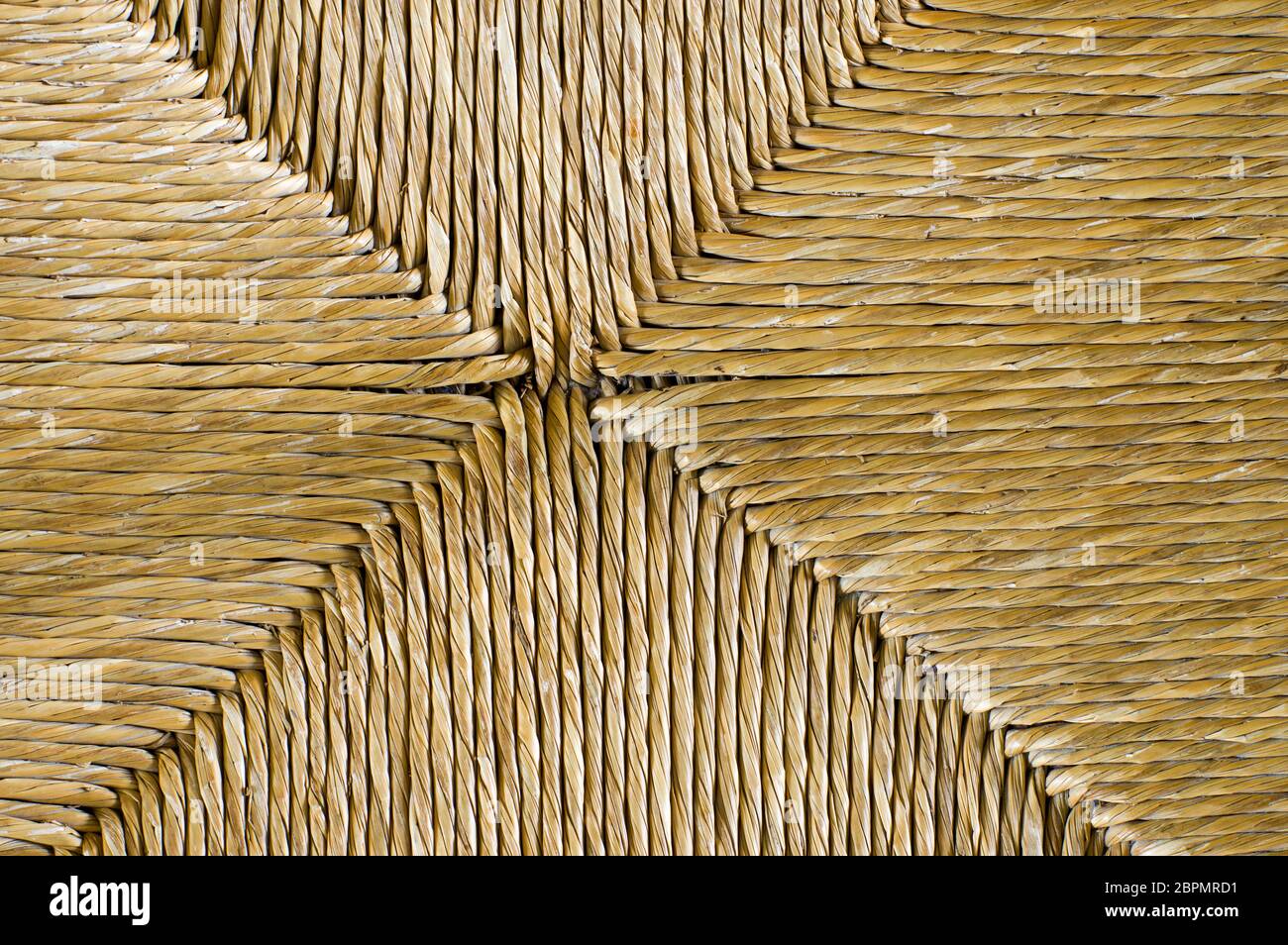 Chaise beige en osier texture fond Banque D'Images