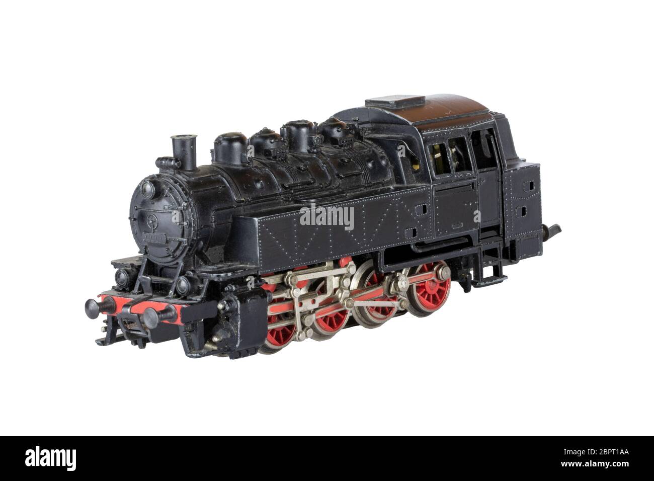 Isolé de la locomotive. Modèle vintage d'un train à vapeur jouet électrique isolé sur un fond blanc. Arrière-plan de décorations. Banque D'Images
