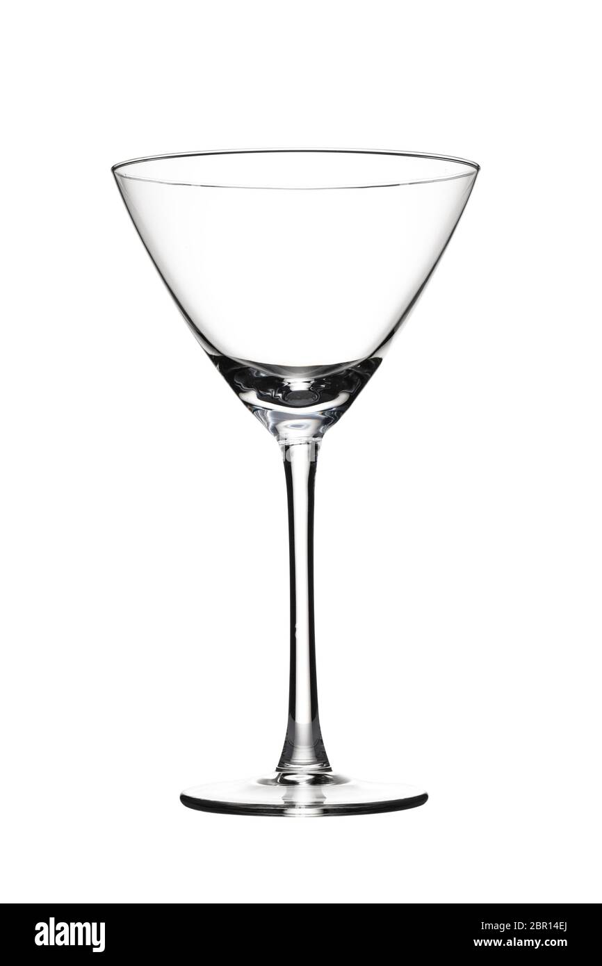 Verre à martini vide contre l'arrière-plan blanc. Banque D'Images