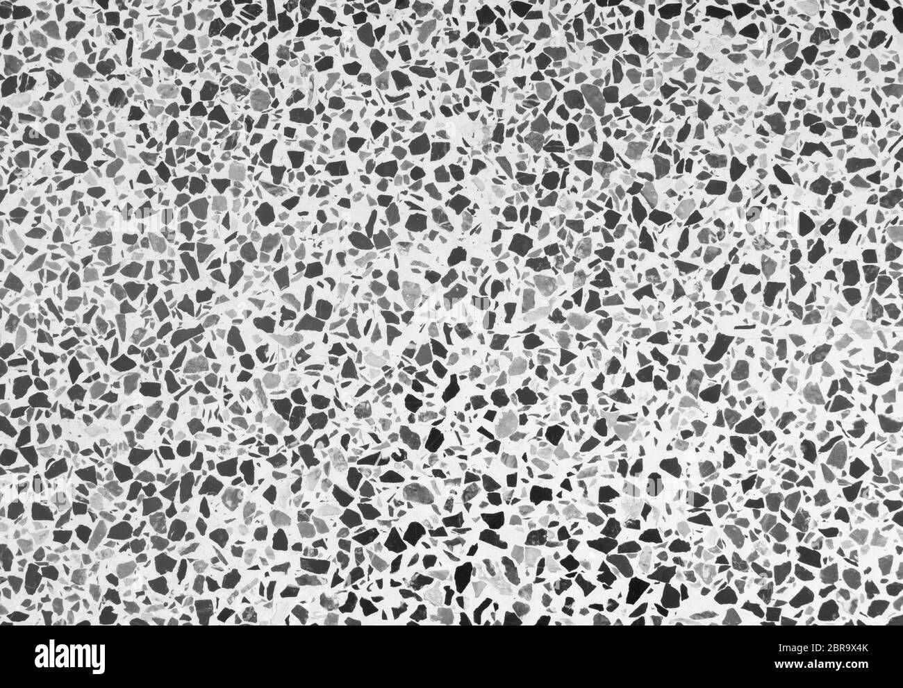 Texture de sol en terrazzo Noir blanc. Petite pierre poli motif ancienne surface marbre vintage pour image de fond horizontale Banque D'Images