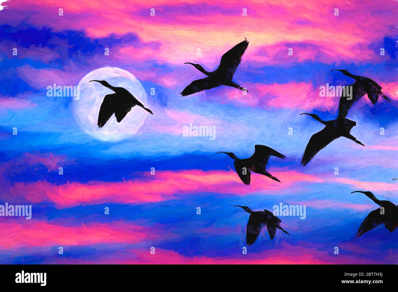 Une Flock of Birds silhouettée volant par la pleine Lune Banque D'Images