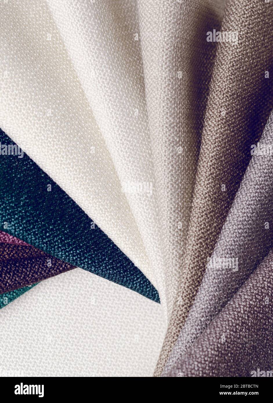 Collection de textiles lumineux de jute d'échantillons. Tissu multicolore texture background. Banque D'Images