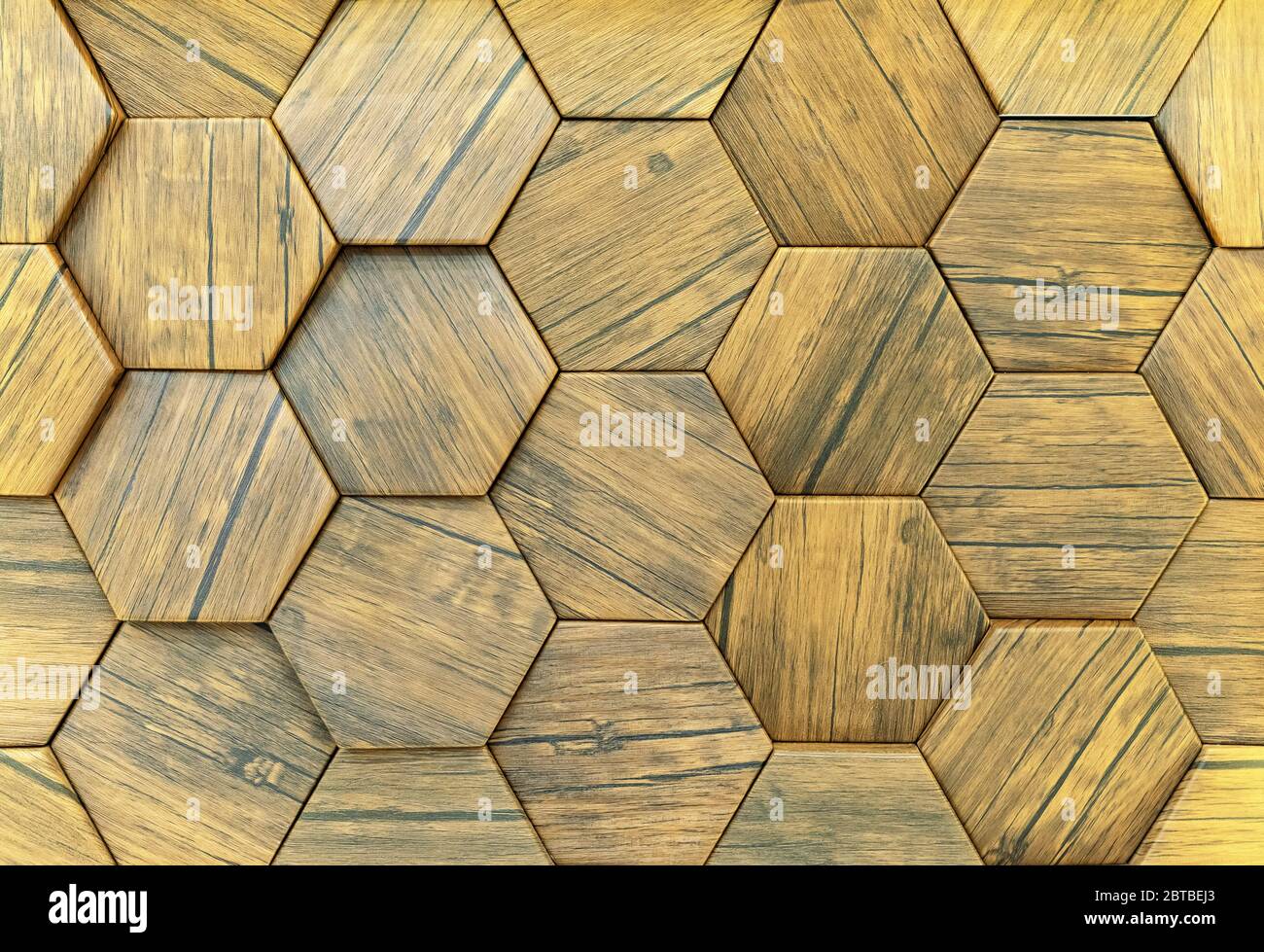 Panneau mural en bois avec effet 3D sous forme de nid d'abeille. Texture volumétrique en bois. Banque D'Images