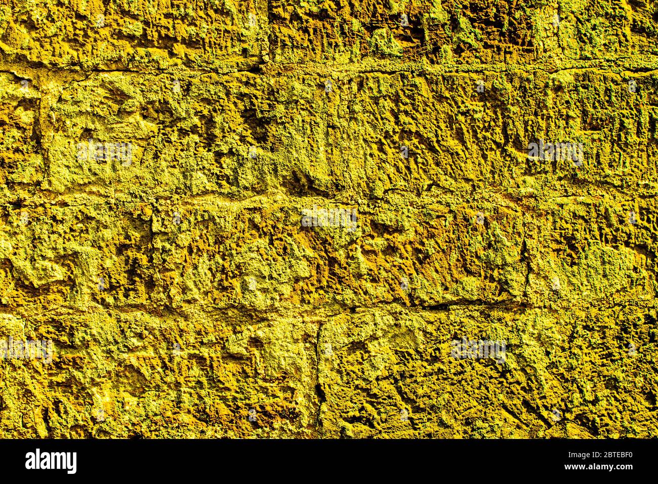 Texture de mur en brique de grès jaune pour le fond Banque D'Images