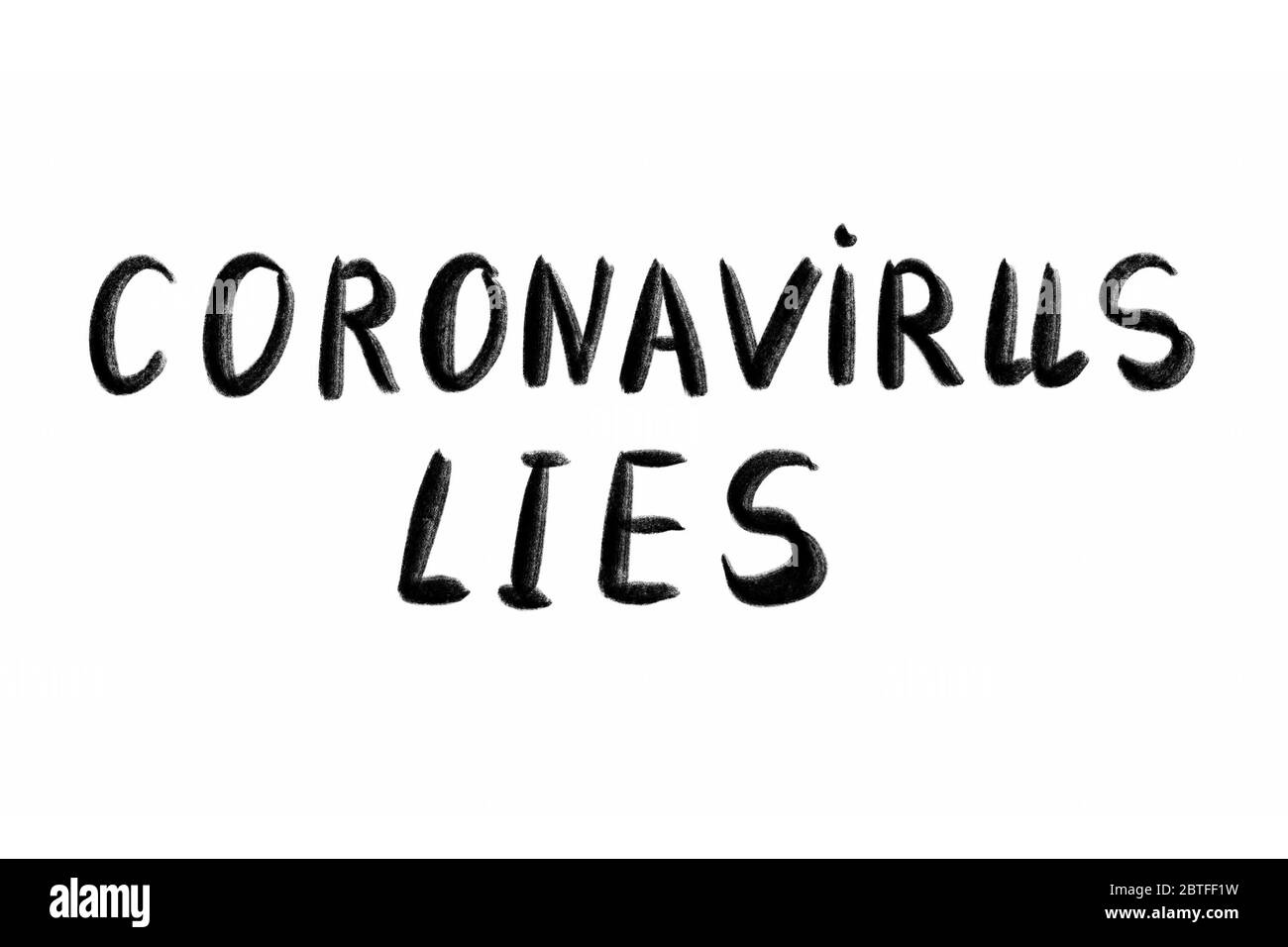 CORONAVIRUS EST LE texte écrit à la main - lettrage isolé sur blanc. Coronovirus COVID 19 concept Banque D'Images