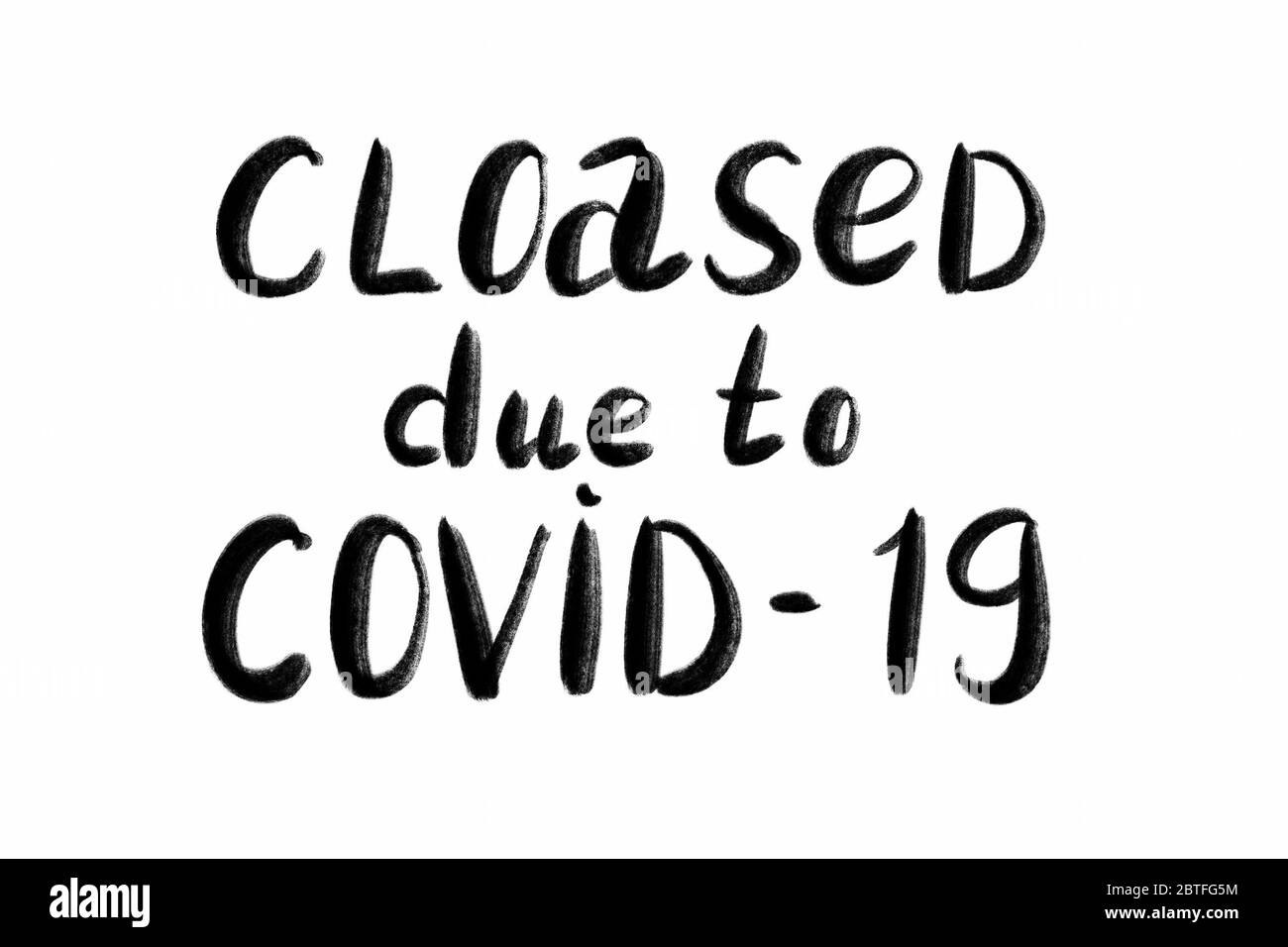 Fermé en raison de Covid-19. Texte écrit à la main - lettrage isolé sur blanc. Coronovirus COVID 19 concept Banque D'Images