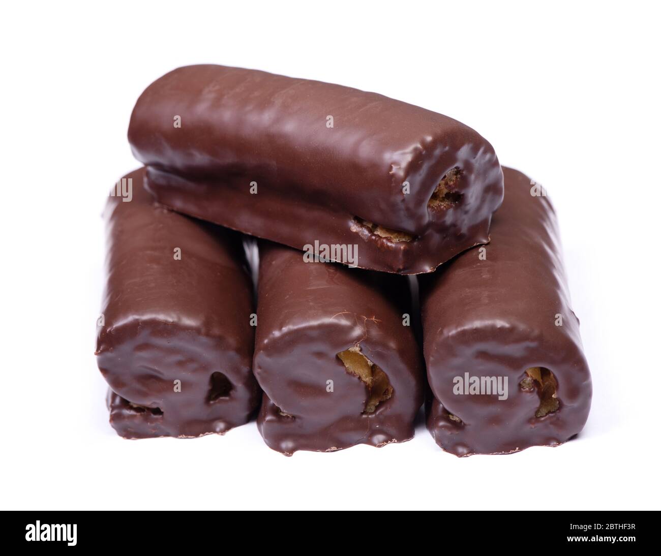 Petits pains de pâtisserie émaillés au chocolat doux isolés sur fond blanc Banque D'Images