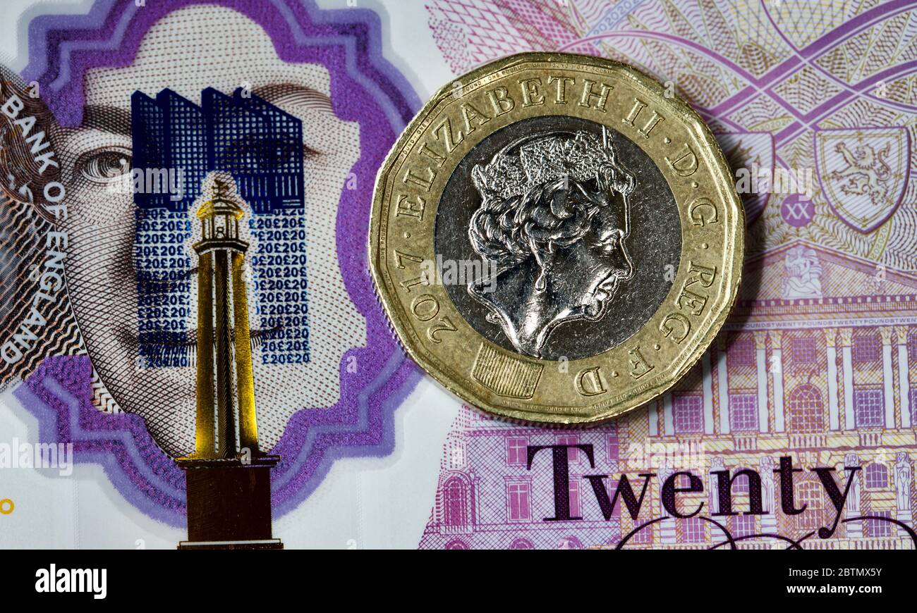 Phare Margate l'une des caractéristiques de sécurité sur le nouveau polymère billet de 20 £ avec une pièce de 1 £ Banque D'Images