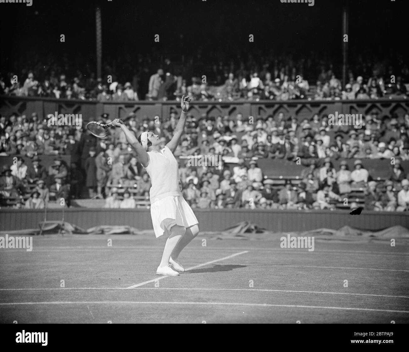 Tennis sur gazon à Wimbledon . Helen Jacobs en jeu contre Mme Helen Wills . 5 juin 1929 Banque D'Images