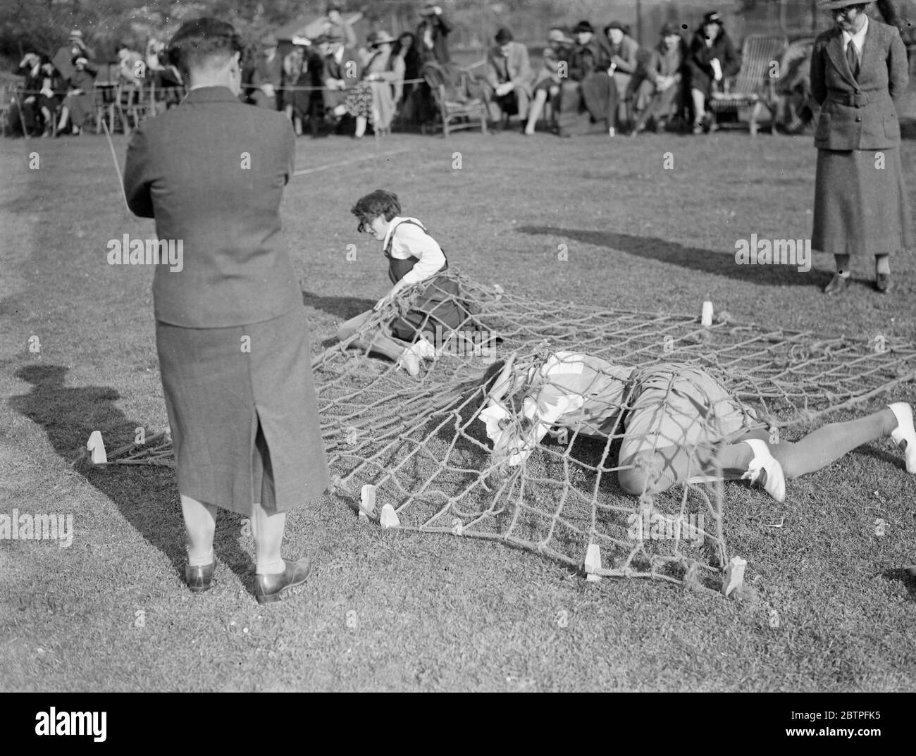 Sports universitaires Swanley . La course à l'assaut . 1936 Banque D'Images