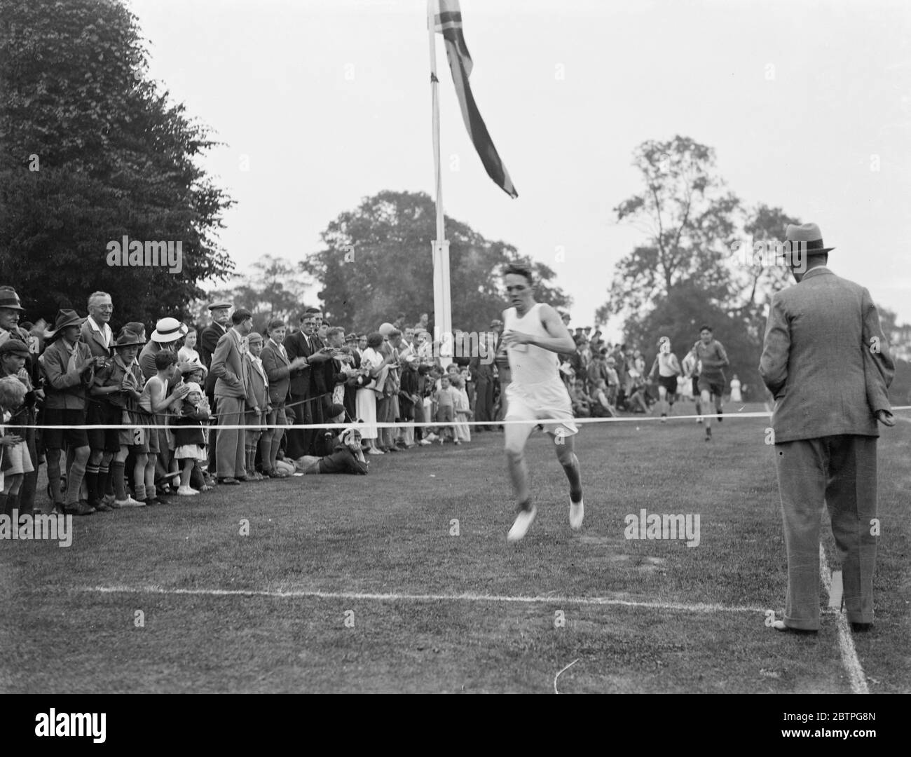 Sports de scouts Sidcup . Une course de repérage pour la ligne de finition . 1937 Banque D'Images