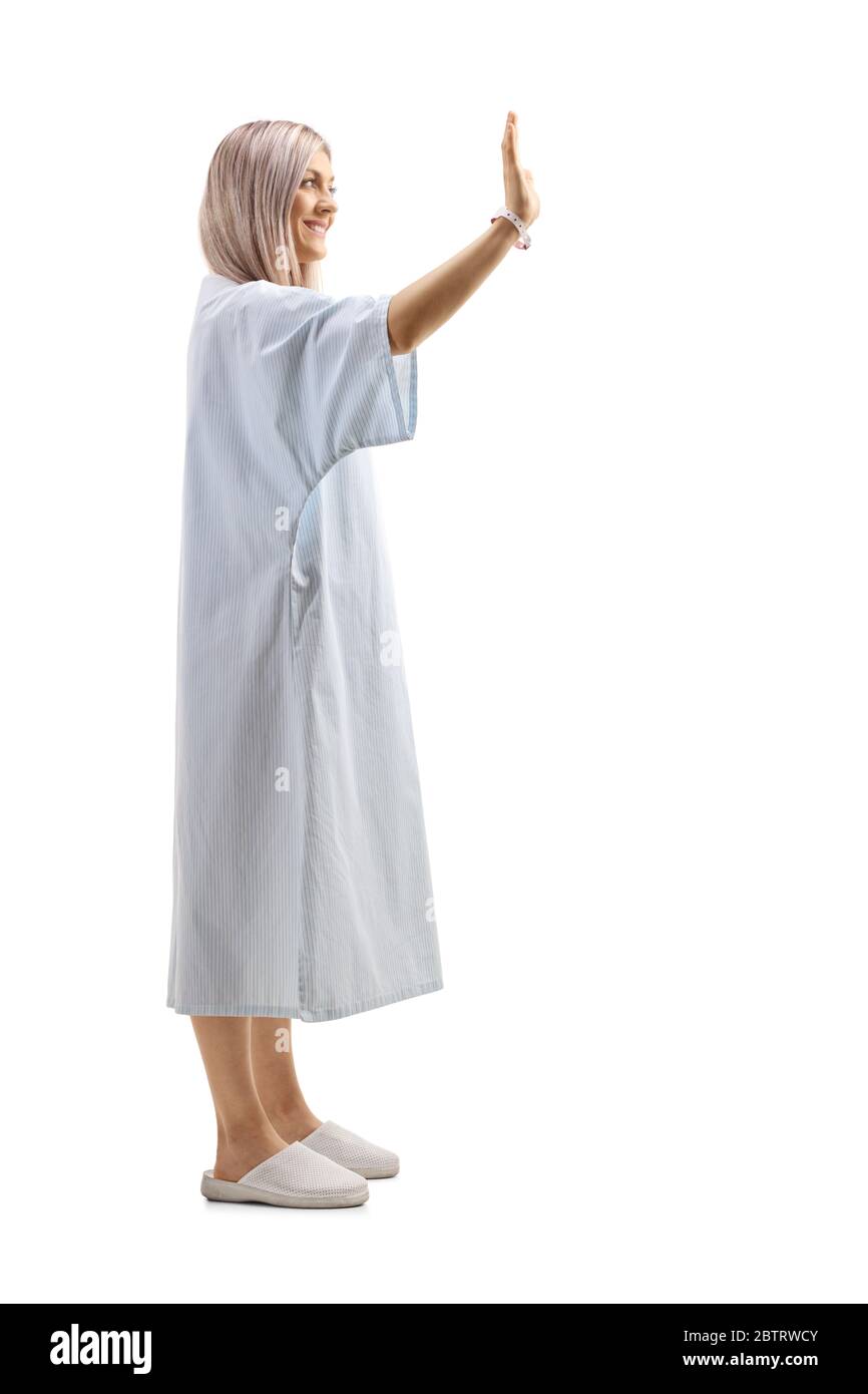 Prise de vue en profil d'un accueil de patient féminin avec une main isolée sur fond blanc Banque D'Images
