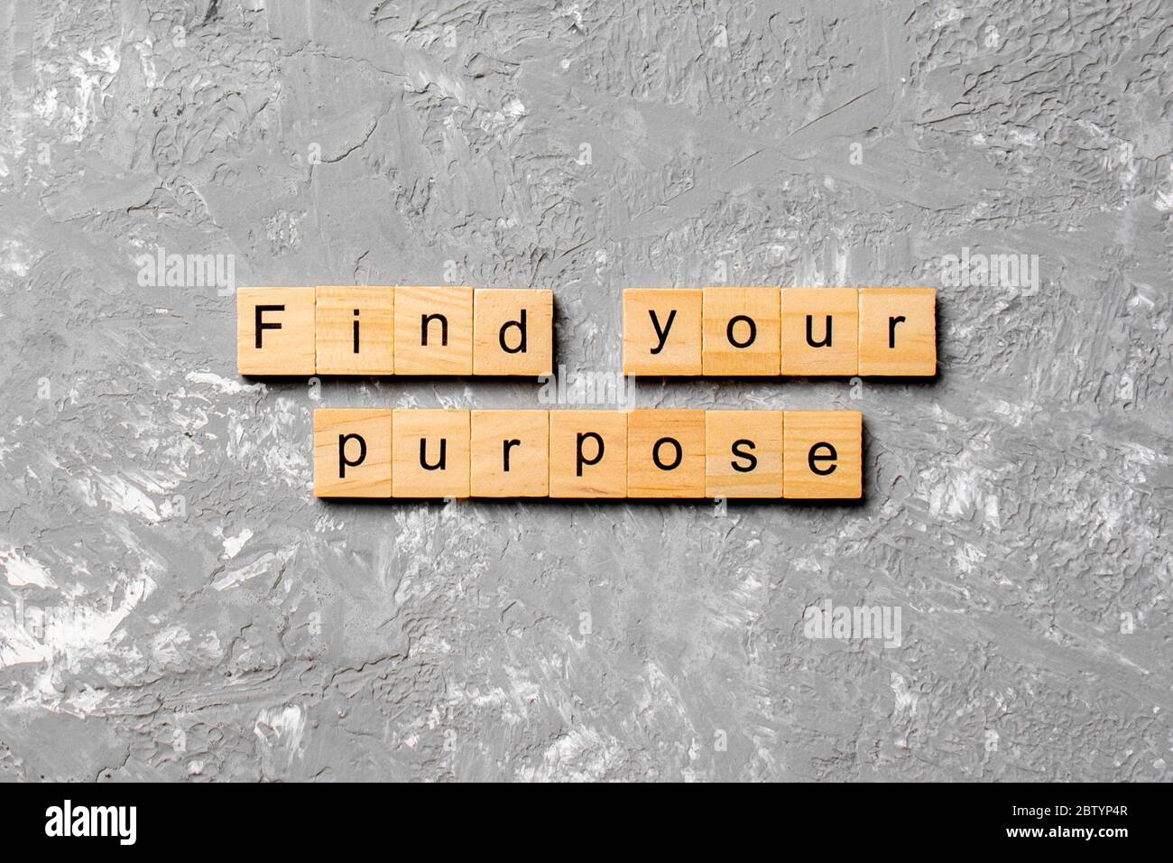 Trouver votre but mot écrit sur une cale en bois. Trouvez votre but texte sur table, concept. Banque D'Images